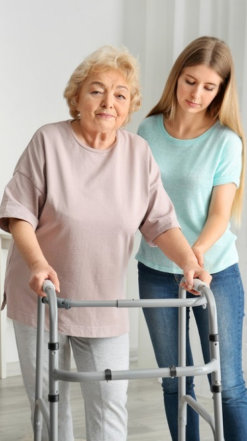 a caregiver woman assisting an elderly woman